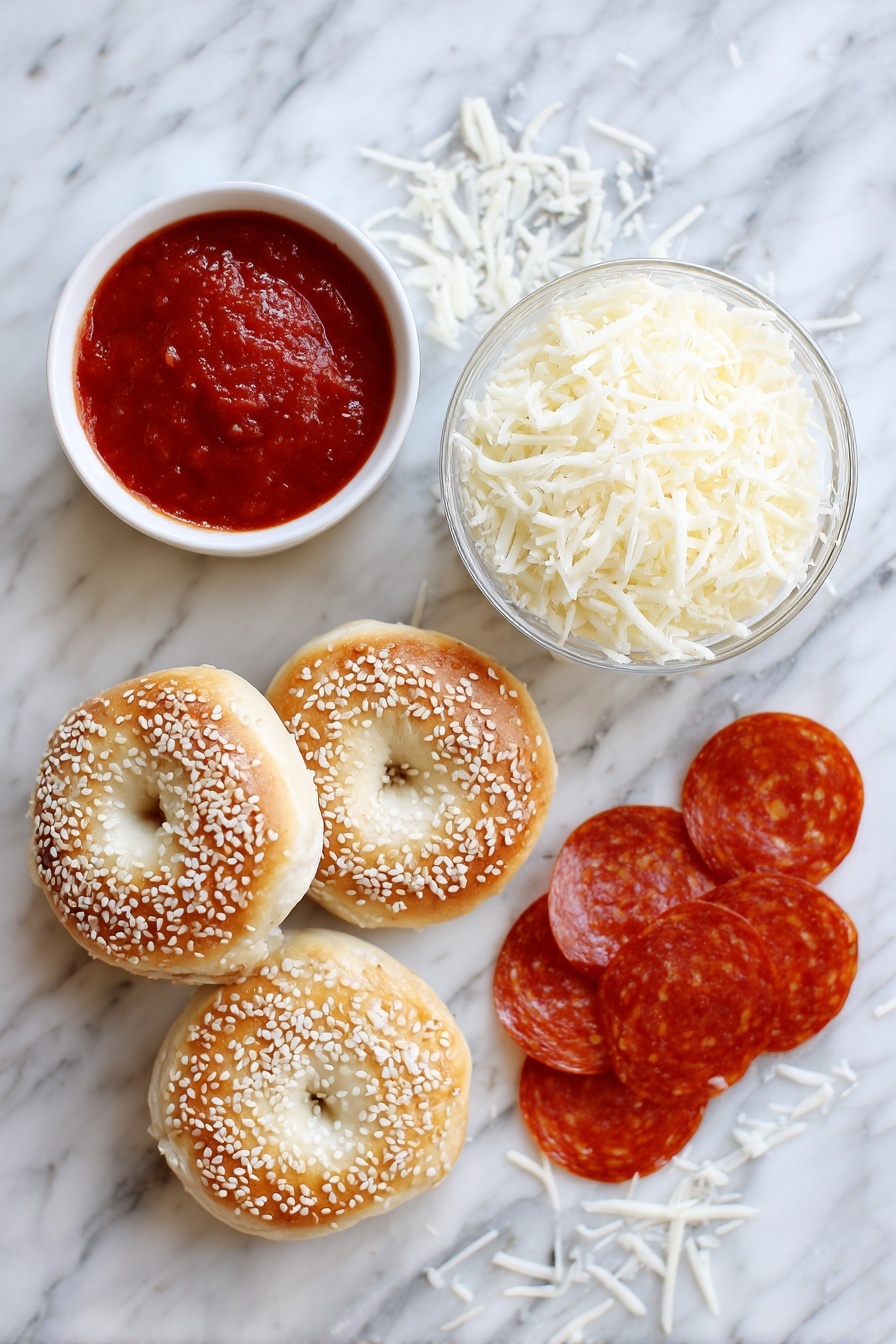 Flat lay of four mini bagels halved, a small bowl of bright red pizza sauce, a generous pile of freshly grated mozzarella cheese, and neatly arranged mini pepperoni slices, all beautifully set with vibrant colors and textures contrasting, placed on a white marble surface, photo taken with an iphone --ar 2:3 --v 7