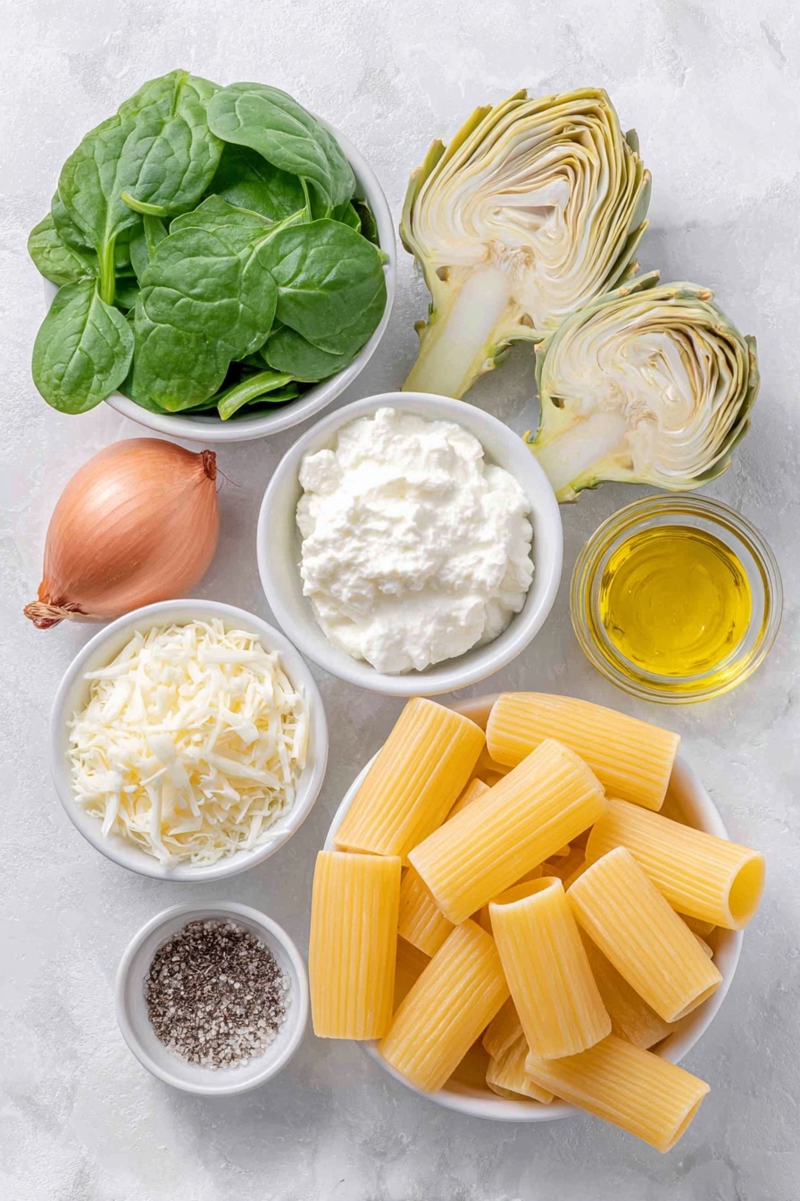 Flat lay of a small pile of uncooked rigatoni pasta, a few fresh brown onions whole and unpeeled, three whole uncracked garlic bulbs, a generous handful of vibrant baby spinach leaves, roughly chopped pale green artichoke hearts, a small white ceramic bowl with creamy white cream cheese, a small white bowl filled with finely grated pecorino cheese, a small white bowl containing fresh cream, a small white bowl with finely grated fresh mozzarella cheese, a small white bowl with golden olive oil, a small white bowl of coarse sea salt crystals, and a small white bowl of freshly ground black peppercorns placed on a clean white marble surface, soft natural light, photo taken with an iPhone, professional food photography style, fresh ingredients, white ceramic bowls, no bottles, no duplicates, no utensils, no packaging --ar 2:3 --v 7 --p m7354615311229779997